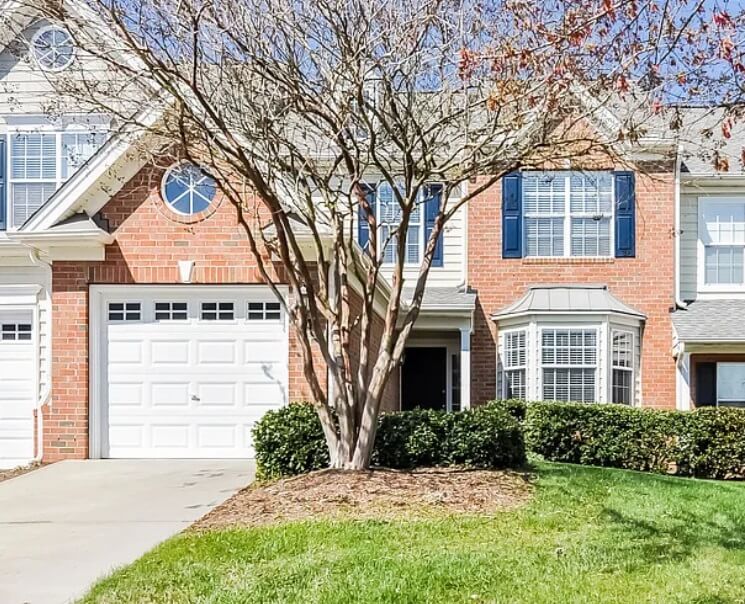 A photo of the front of 11208 Presidio Drive, Raleigh, NC taken from the street.